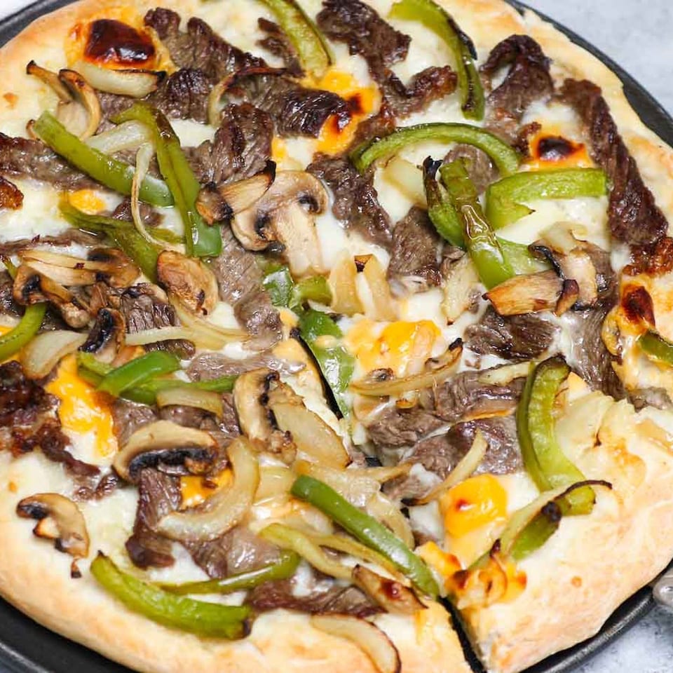 Indulge in Our Cheesesteak